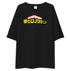 A black oversized short-sleeve t-shirt featuring a 'My Hero Academia' graphic on the chest with red and yellow text and Japanese characters, displayed against a solid white background.